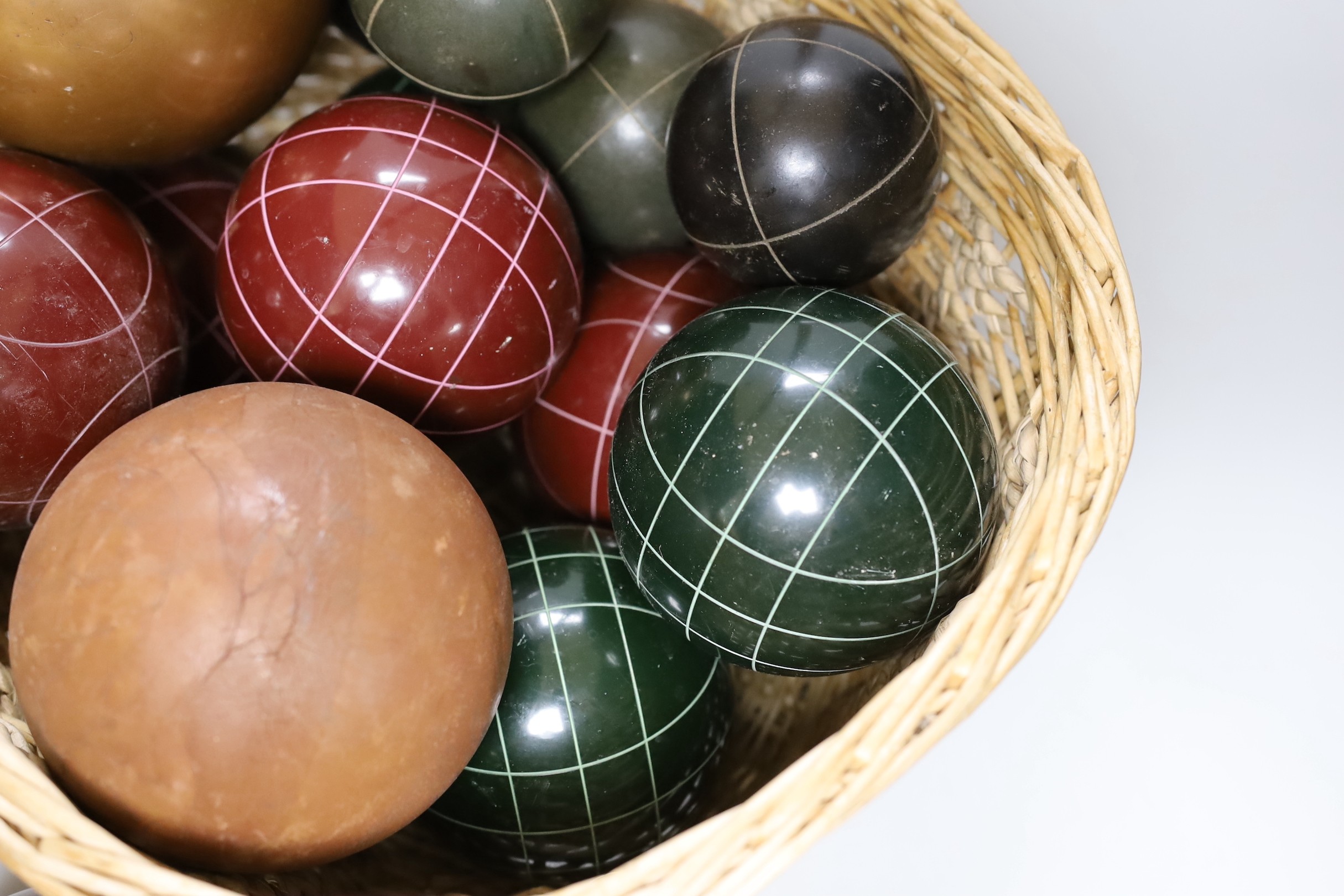 A basket of decorative varying sized balls